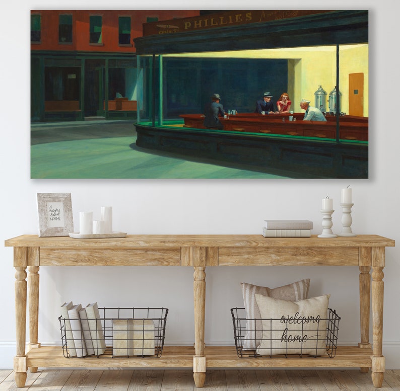 May include: A painting of a diner at night with the sign "PHILLIES" above the window. There are four people sitting at the counter, and the diner is lit by a warm yellow light.
