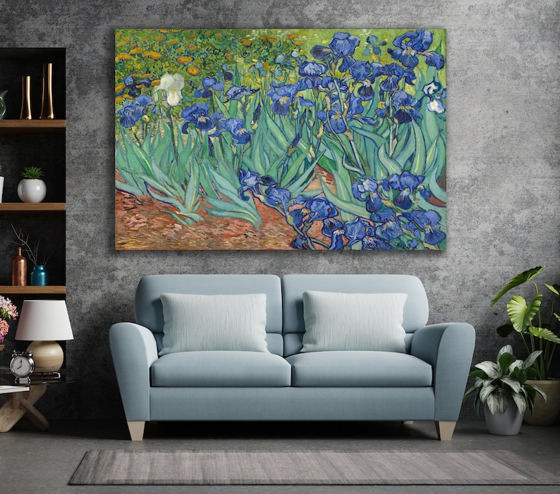 May include: A painting of a field of blue irises with green leaves. The flowers are in full bloom and the leaves are lush and green. The painting is done in a style reminiscent of Vincent van Gogh.