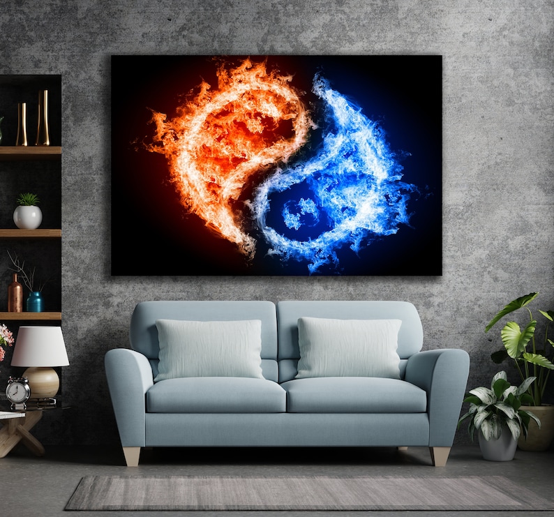 May include: Abstract art print featuring a yin yang symbol made of fire and water. The left side of the symbol is orange and red flames, while the right side is blue and white water.