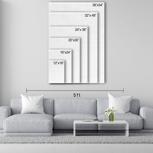 May include: A display of white canvas art prints in various sizes, including 12x16 inches, 16x24 inches, 20x30 inches, 24x36 inches, 32x48 inches, and 36x54 inches. The prints are displayed above a gray sofa, with a 5 ft measurement indicated.