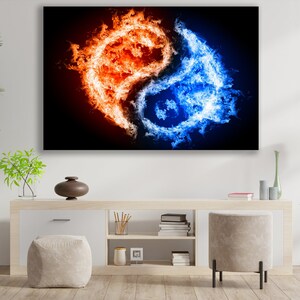 May include: A yin yang symbol made of fire, with one side red and the other blue, against a black background.