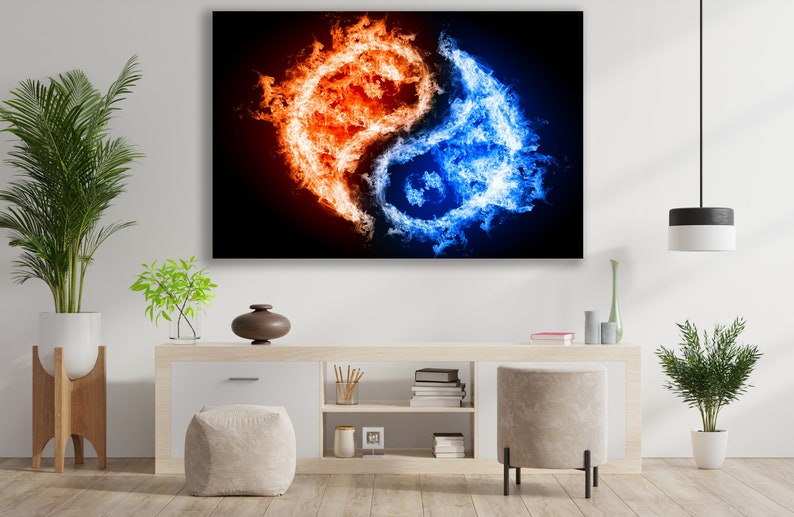 May include: A yin yang symbol made of fire, with one side red and the other blue, against a black background.