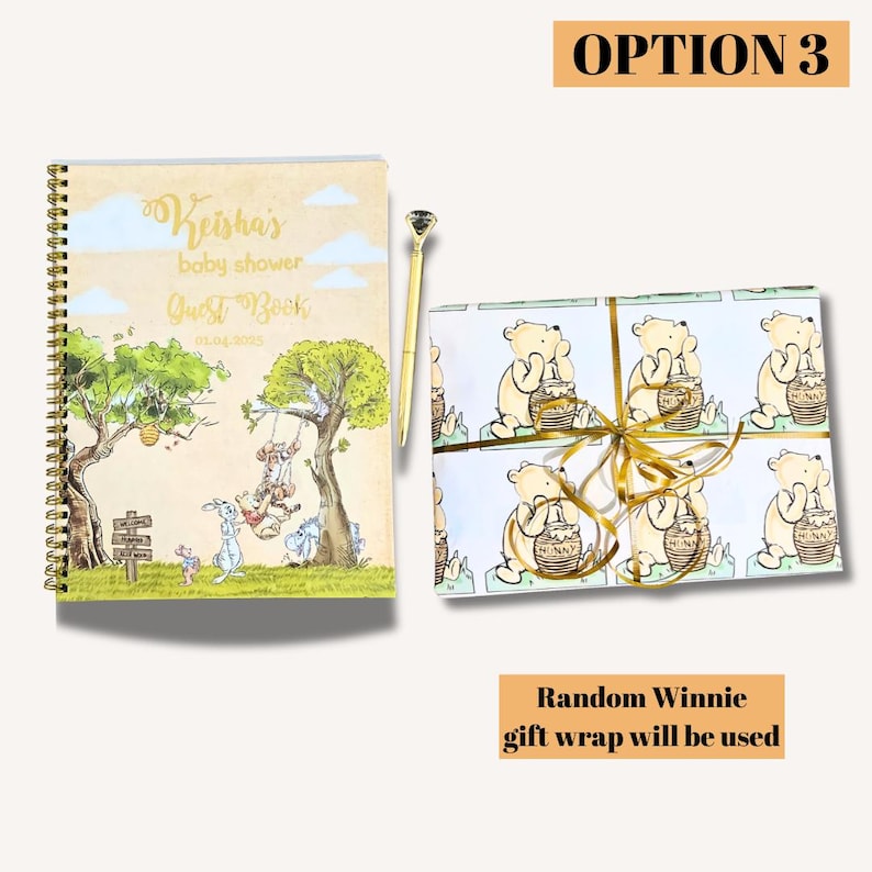 May include: A baby shower guest book with a spiral binding, featuring a whimsical illustration of Winnie the Pooh characters. A gold pen with a diamond-shaped top rests beside the book. A gift wrapped in Winnie the Pooh-themed paper is also shown.