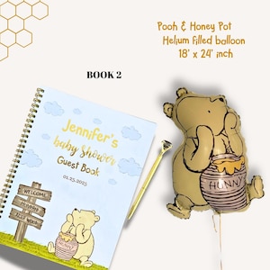 May include: A baby shower guest book with a Winnie the Pooh theme, featuring a spiral-bound notebook with the text "Jennifer's baby shower Guest Book" and a Pooh balloon. The balloon measures 18 x 24 inches.