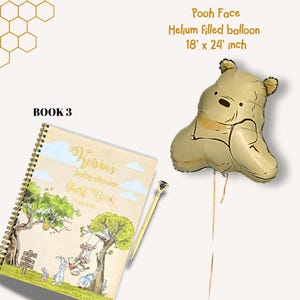 May include: A Winnie the Pooh-themed baby shower guest book and balloon. The guest book has a spiral binding and a cover with illustrations of Winnie the Pooh characters. A gold-colored pen and a Pooh face helium balloon, 18 x 24 inches, are also present.