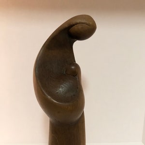 Hand carved Madonna and baby made from beautiful maple wood.