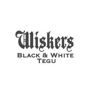 May include: The image features a logo with the word "Whiskers" in a stylized, gothic font. Below, the text "BLACK & WHITE TEGU" is displayed in a simple, sans-serif font, all in black against a white background.