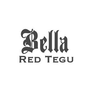 May include: The image displays the text "Bella RED TEGU" in a stylized, dark gray font against a white background. The word "Bella" is in an ornate, gothic-style font, while "RED TEGU" is in a simpler, sans-serif font.