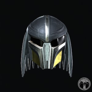 May include: A black and silver helmet with a yellow and silver face mask. The helmet has a long, black braid on each side.