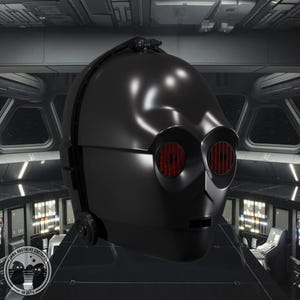 May include: A black C-3PO-style helmet with red eye lenses. The helmet has a smooth, reflective surface and is designed with a rounded top and a distinct facial structure. The image is set against a futuristic, metallic background.