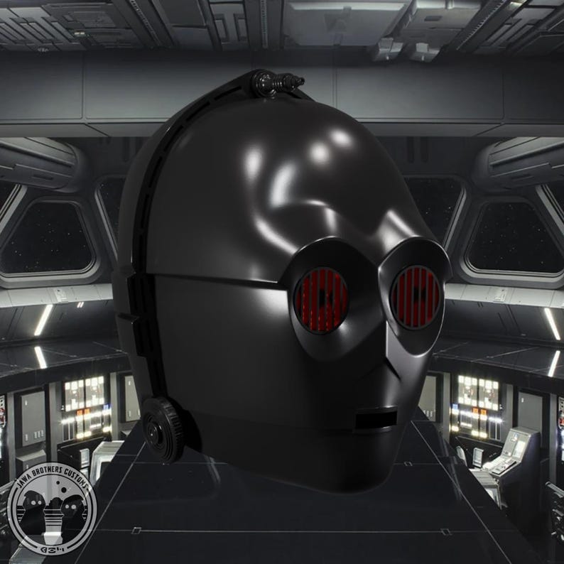 May include: A black C-3PO-style helmet with red eye lenses. The helmet has a smooth, reflective surface and is designed with a rounded top and a distinct facial structure. The image is set against a futuristic, metallic background.