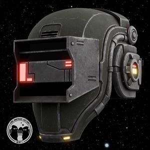 May include: A dark grey, weathered helmet featuring a prominent rectangular visor with glowing red light accents. The side displays circular mechanical ear pieces with yellow lights. A circular logo with the text Jawa Brothers Customs is visible.