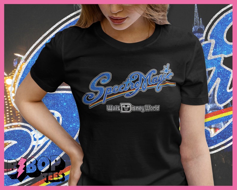 May include: A black t-shirt with a blue and white graphic that says "SpectroMagic Walt Disney World" with a Mickey Mouse head logo.