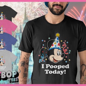 May include: A black t-shirt with a cartoon image of Mickey Mouse wearing a party hat and confetti. The text "I Pooped Today!" is printed below the image.