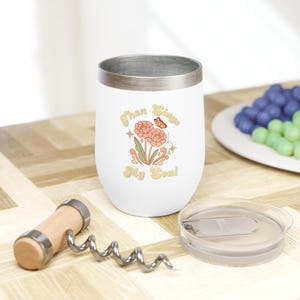May include: White stainless steel wine tumbler featuring a floral design and the text "Then Sings My Soul".