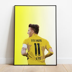 May include: A yellow and black soccer jersey with the number 11 and the text "Dortmund" and "Reus" on the back.
