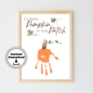 May include: Printable art print with the text "Cutest Pumpkin in the Patch" and a handprint shaped like a pumpkin. The pumpkin is orange with a brown stem and green leaves. The text is in brown and the leaves are green.