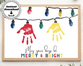 May include: A printable Christmas card featuring a string of colourful handprint lights with the text "May your days be MERRY & BRIGHT".