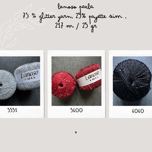Op de afbeelding: Drie bollen garen, &eacute;&eacute;n zilver, &eacute;&eacute;n rood en &eacute;&eacute;n zwart. Elke bol is gelabeld met "Lanoso Lalia" en heeft een samenstelling van 75% glinstergaren en 25% pailletten. Het garen is 217 meter lang en weegt 25 gram.