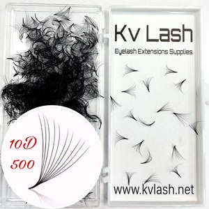 May include: A clear plastic container with a white background containing 500 individual black eyelash extensions. The container has a white circle with the text "10D 500" in red. The container is labeled "Kv Lash Eyelash Extensions Supplies" and "www.kvlash.net".
