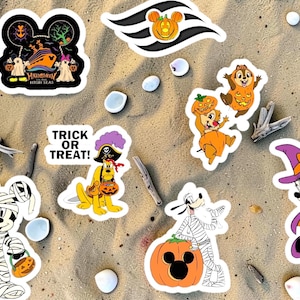 May include: A collection of seven Halloween-themed stickers featuring Disney characters. Designs include Mickey Mouse as a mummy, Pluto as a pirate with the text TRICK OR TREAT, Goofy with a pumpkin, Chip and Dale, and Minnie Mouse as a witch.