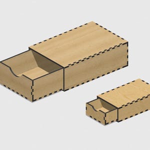 Puede incluir: Dos cajas de madera con cajones. La caja más grande está abierta, revelando un cajón vacío. La caja más pequeña está cerrada.