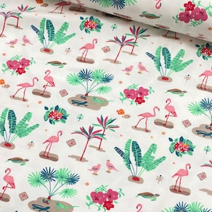 May include: White fabric printed with a tropical design. The pattern includes pink flamingos, green plants, pink flowers, and small birds. There are also turtles, fish, and decorative square shapes. Ideal for sewing and craft projects.