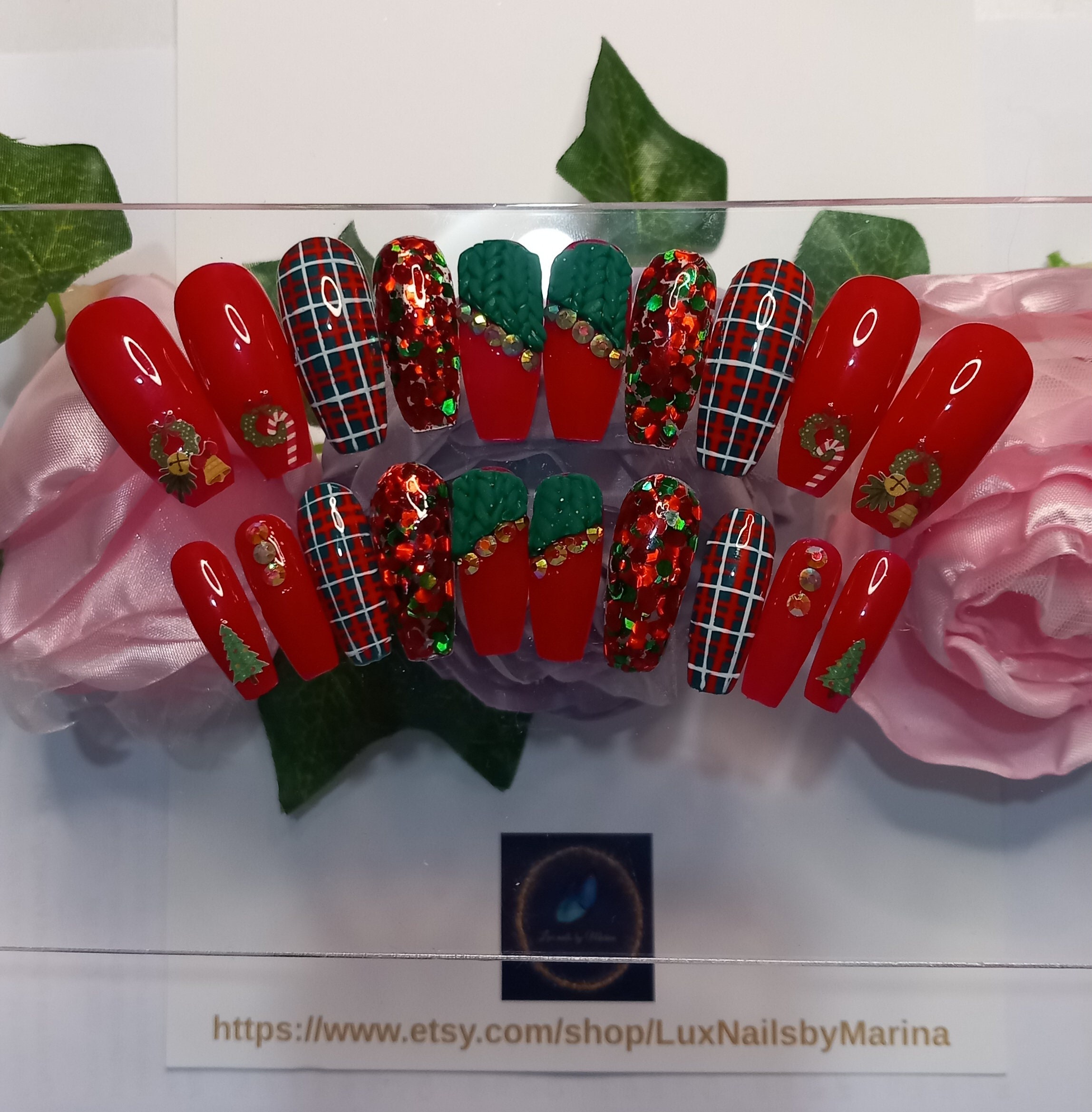Luxury handmade one of a kind press on nail kit. Long coffin shaped red and green christmas nails with 3D sweater details and glitter.