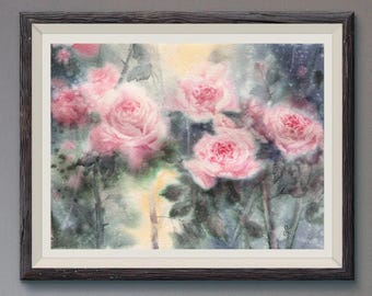 May include: Watercolor painting of pink roses in a dark wooden frame. The artwork features a soft, blurred style with the roses as the focal point. The background has a mix of green, yellow, and blue hues.