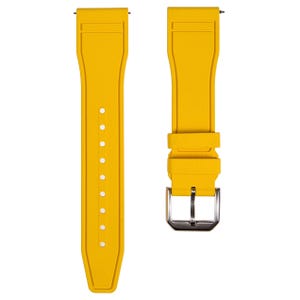 Op de afbeelding: Een felgeel horlogebandje van rubber met een zilveren gesp.