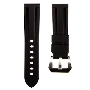 May include: Black rubber watch strap with a stainless steel buckle. The strap has a textured surface and is designed for a watch with a 22mm lug width.