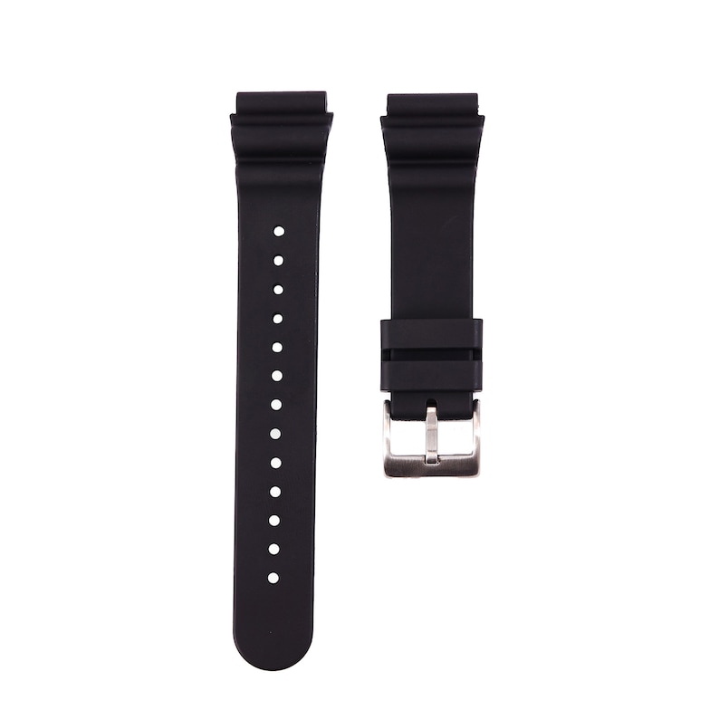 May include: A black rubber watch strap with a silver buckle.