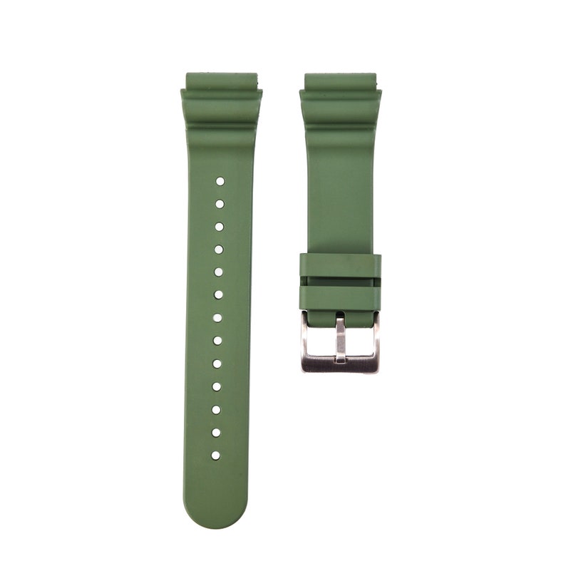 May include: A green silicone watch strap with a silver buckle.