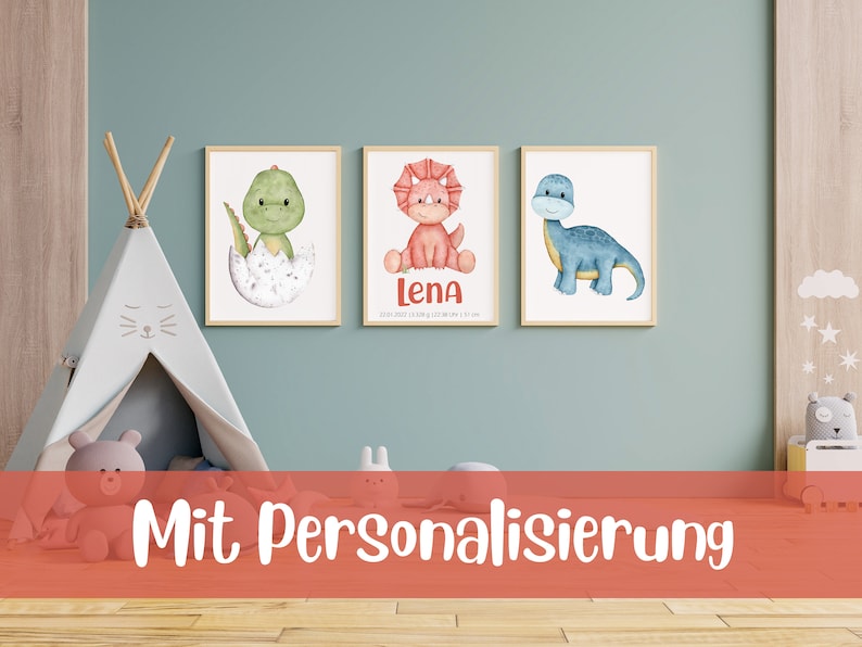 May include: Three framed watercolor illustrations of dinosaurs. The first shows a green dinosaur hatching from an egg. The second shows a pink dinosaur with a red frill. The third shows a blue dinosaur. The frames are light wood and the illustrations are on white backgrounds. The text "Lena" is printed below the pink dinosaur.