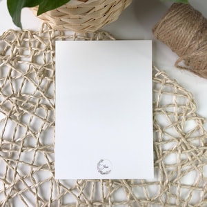 Rückseite einer Postkarte mit Logo von ART BY Jessi