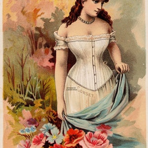 May include: A woman in a white corset with a blue skirt stands in a garden setting. She is holding a bouquet of pink, yellow, and red roses. The corset has the text "Overbust Ladybustle Corset" printed on it.