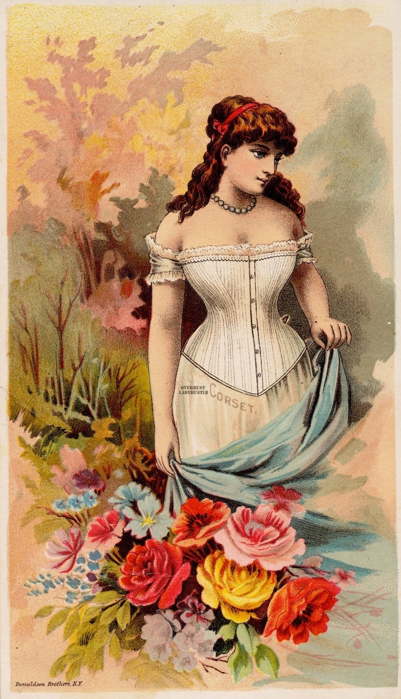 May include: A woman in a white corset with a blue skirt stands in a garden setting. She is holding a bouquet of pink, yellow, and red roses. The corset has the text "Overbust Ladybustle Corset" printed on it.