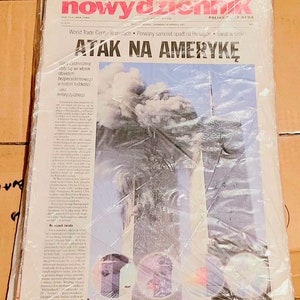 Rare Polish 9/11 full Newspaper 9/12/01 always Been in Plastic see details.