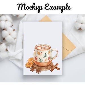 May include: A mockup image featuring a white card with a watercolor illustration of a mug of hot beverage, orange slices, cinnamon sticks, and star anise. The mug has a fall-themed design. The words "Mockup Example" are written at the top.