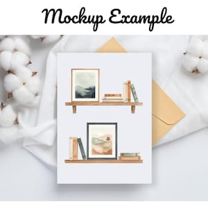 May include: A mockup featuring two wooden shelves with framed watercolor landscape art and stacks of books. The top shelf has a landscape painting with blue and green hues. The bottom shelf has a landscape painting with brown and orange hues.
