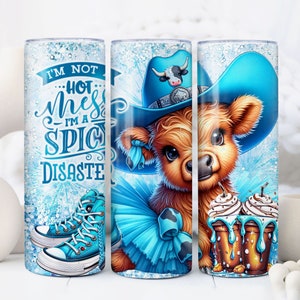 May include: A blue and white tumbler with a cow wearing a blue cowboy hat and a blue tutu. The tumbler has the text "I'm not... hot mess... I'm a spicy disaster" on it.