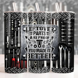 May include: Three stainless steel tumblers with a black and white design featuring tools and the text "Leftover Parts Are Proof You Made It Better".