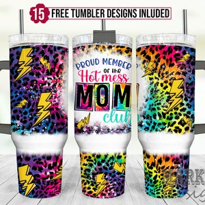 May include: A stainless steel tumbler with a black lid and handle. The tumbler has a colorful design with a leopard print, lightning bolts, and the text "Proud Member of the Hot Mess Mom Club".