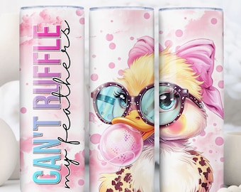 May include: A pink and white tumbler with a cartoon duck wearing sunglasses and a pink bow. The duck is blowing a pink bubble. The tumbler has the text "Can't ruffle my feathers" on the side.