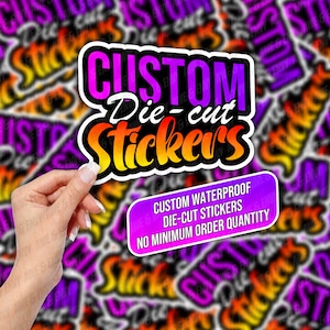 May include: A custom die-cut sticker with a purple, orange, and yellow gradient. The text "CUSTOM Die-cut Sticker's" is in a bold, stylized font. A smaller purple sticker below reads "CUSTOM WATERPROOF DIE-CUT STICKERS NO MINIMUM ORDER QUANTITY".