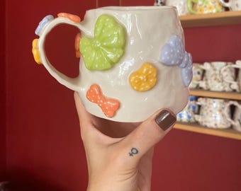 Handmade Ceramic Bows Mug: Colorful Hand-Painted Coffee Cup