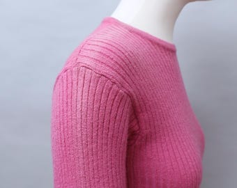 Ribbed-knit cropped sweater in pink - Courreges | Mytheresa