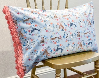 Handmade crochet trim floral pillowcase, blue pink dog puppy fabric with coral pink crocheted edge. Pretty vintage look pillow case sham