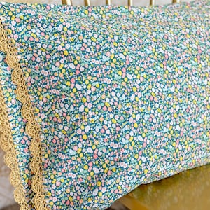 Handmade crochet trim floral pillowcase.  Pretty turquoise teal flower fabric with gold / yellow organic crocheted edge pillow case sham