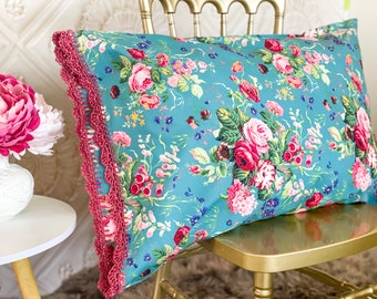 Handmade crochet trim floral pillowcase.  Pretty turquoise teal flower fabric with pink organic crochet edge pillow case sham